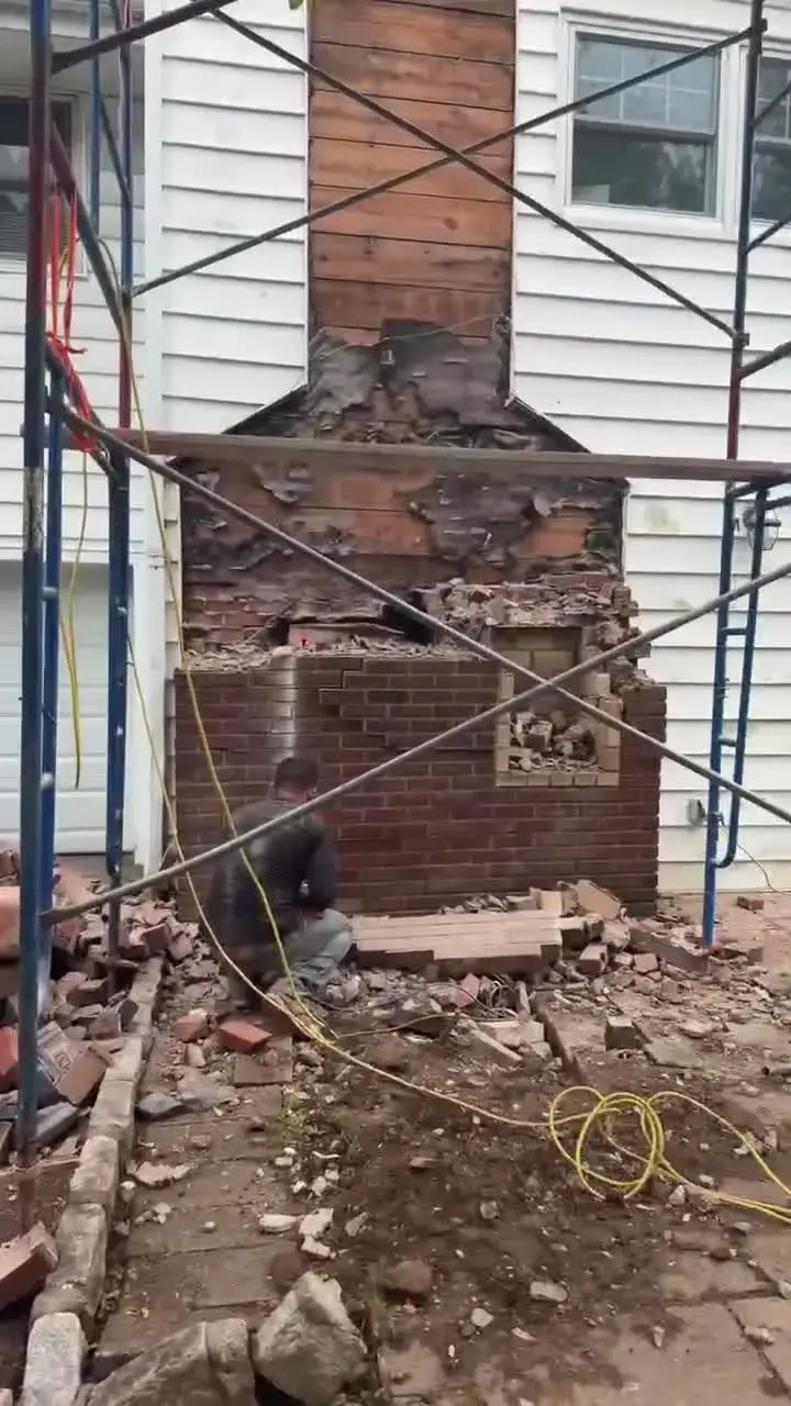 Exterior brick chimney demolition, job-site video